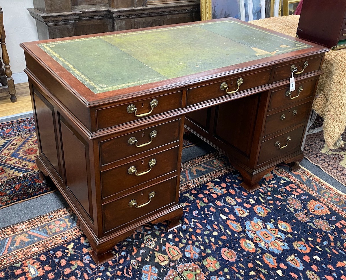 A George III style mahogany pedestal desk, width 140cm, depth 78cm, height 80cm